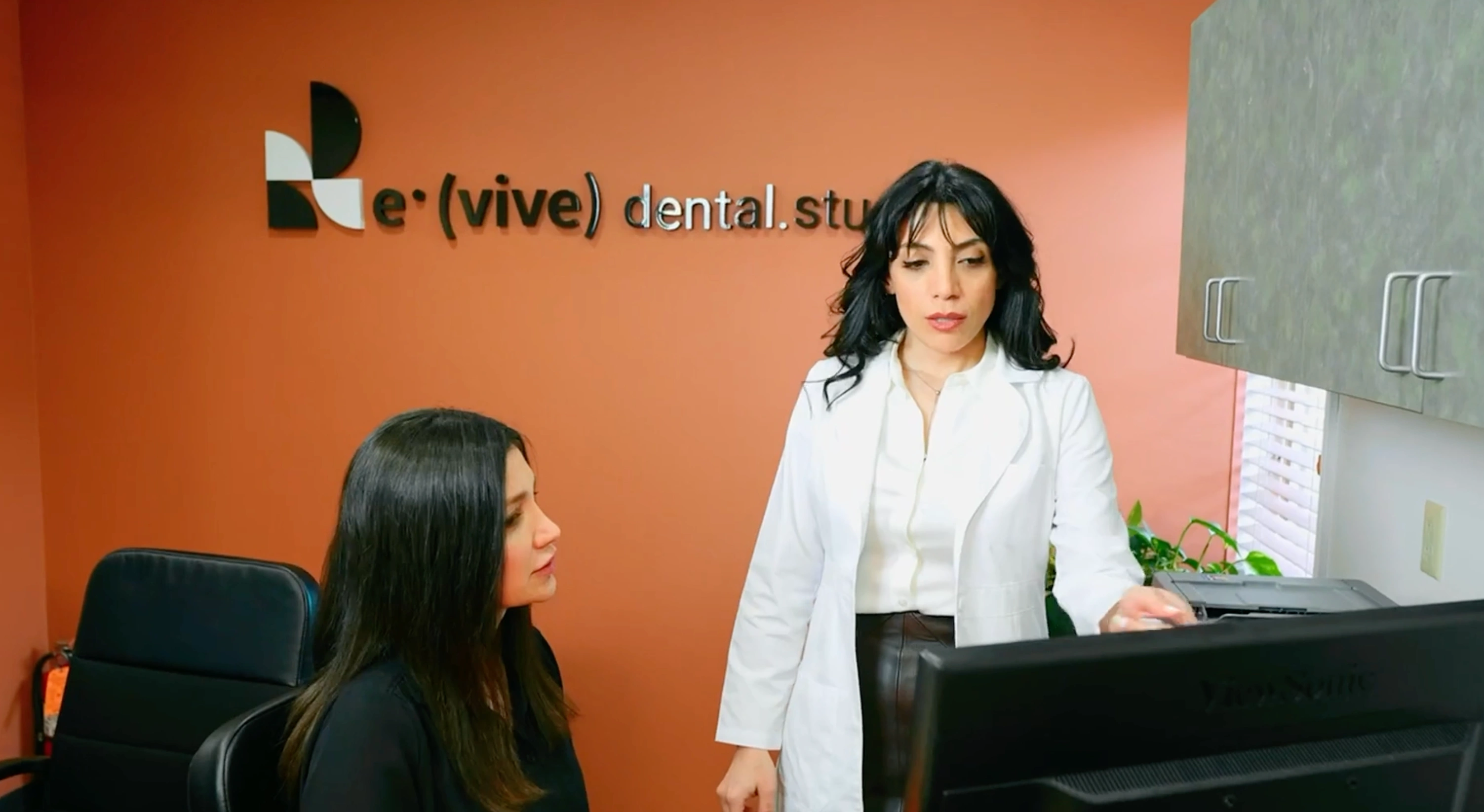 Revive Dental Studio team members at the front desk