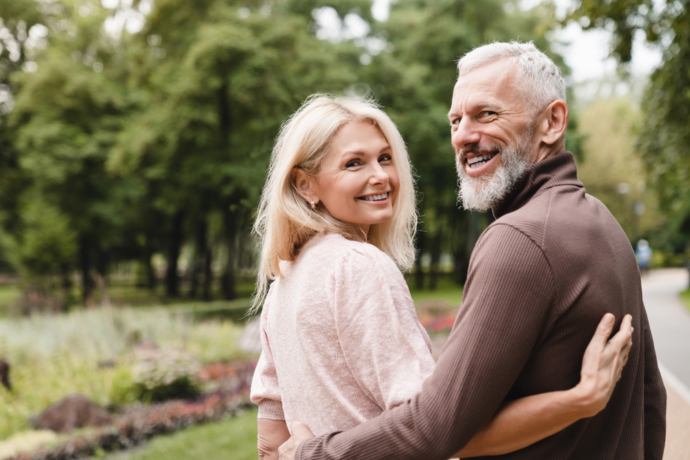 A smiling couple outdoors