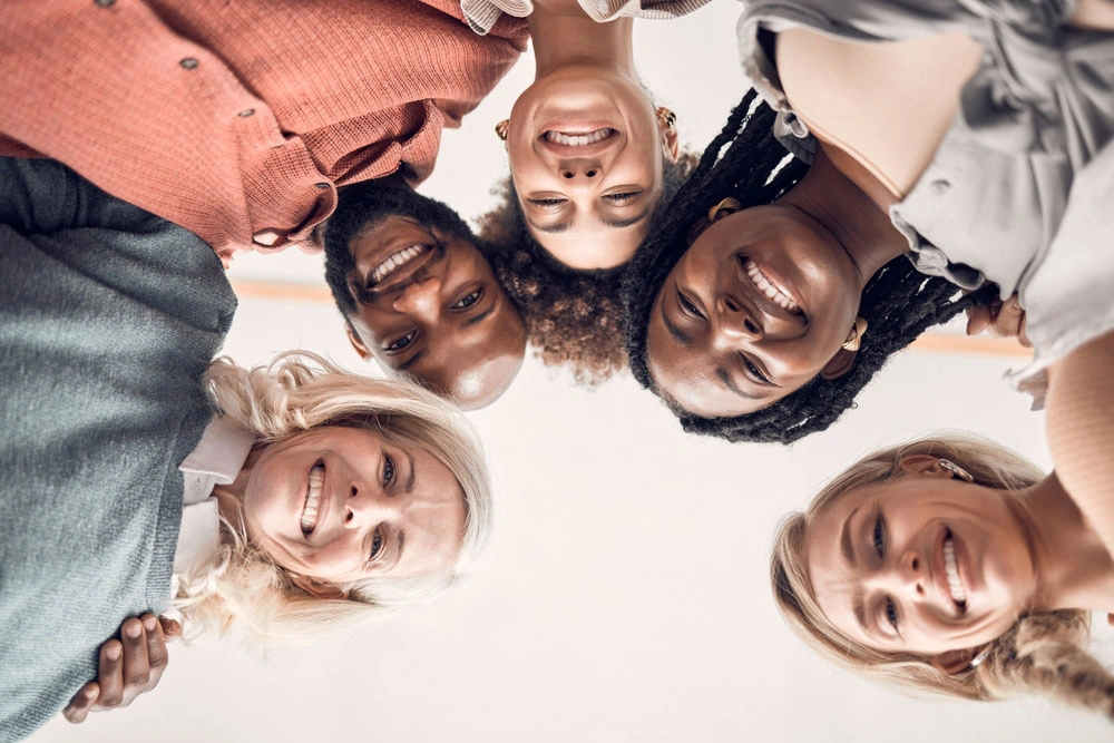 A diverse group smiling together
